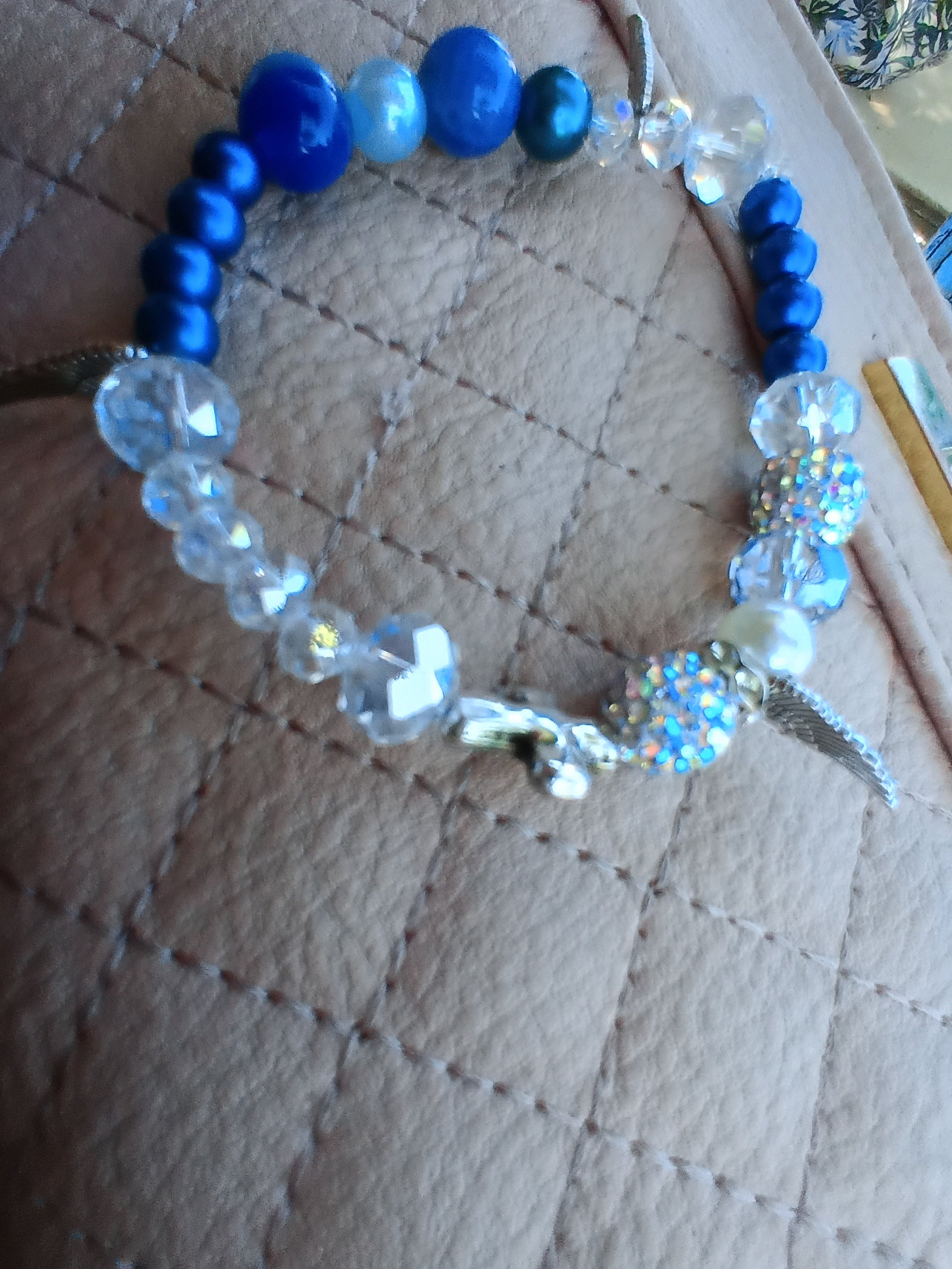 Blue Angel memorial bracelet with royal blue beads and silver angel wing charm
